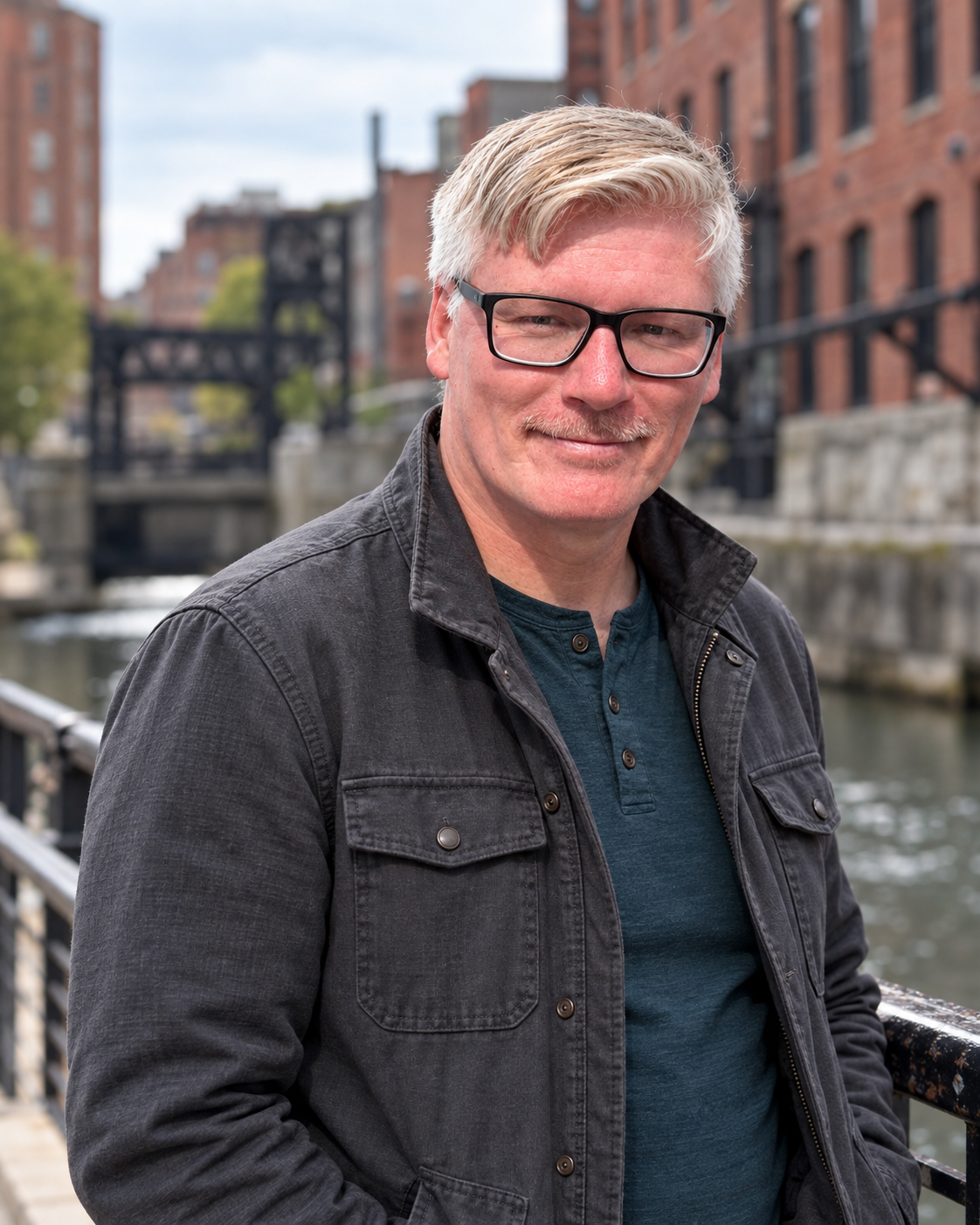 Artur Bobinski, founder of Kenton Web Design, standing by the water in Western New York.